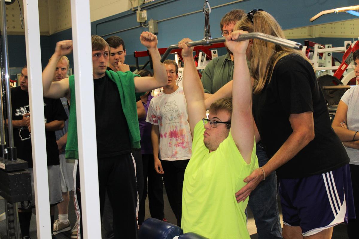 DRD Student doing weight training through APE